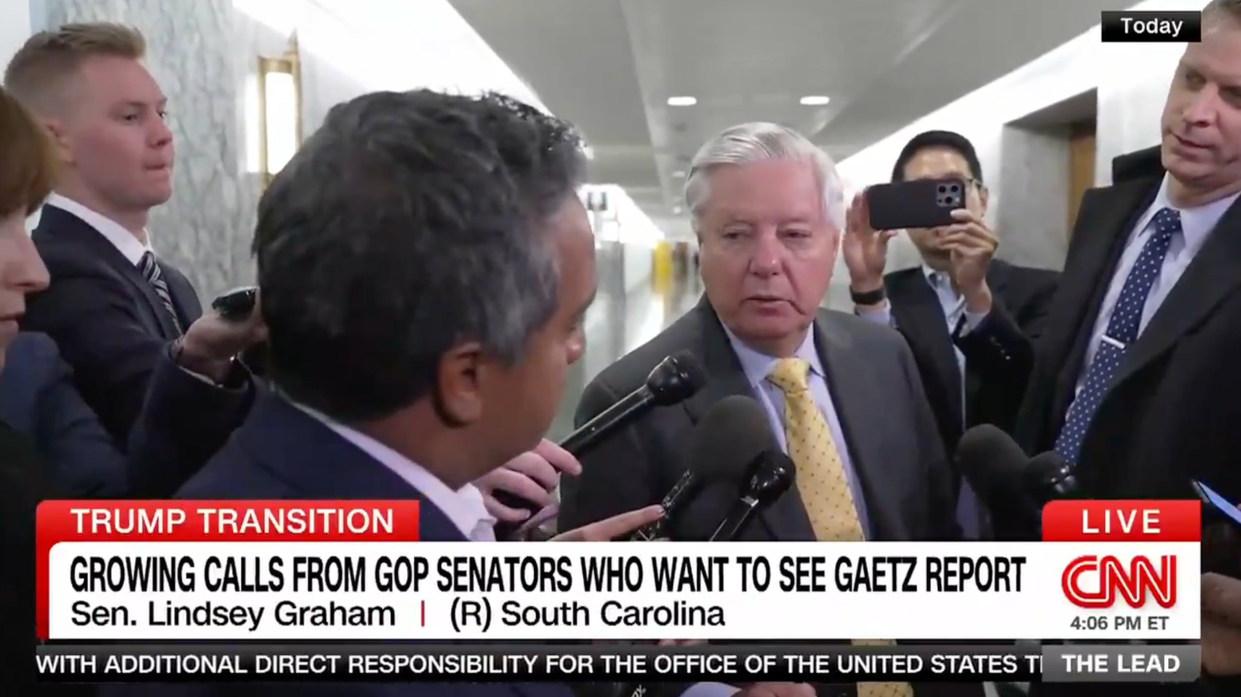 Sen. Lindsey Graham (R-SC) scrums with journalists on Capitol Hill.