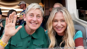 INGLEWOOD, CALIFORNIA - FEBRUARY 13: (L-R) Ellen DeGeneres and Portia de Rossi attend Super Bowl LVI at SoFi Stadium on February 13, 2022 in Inglewood, California. (Photo by Kevin Mazur/Getty Images for Roc Nation)