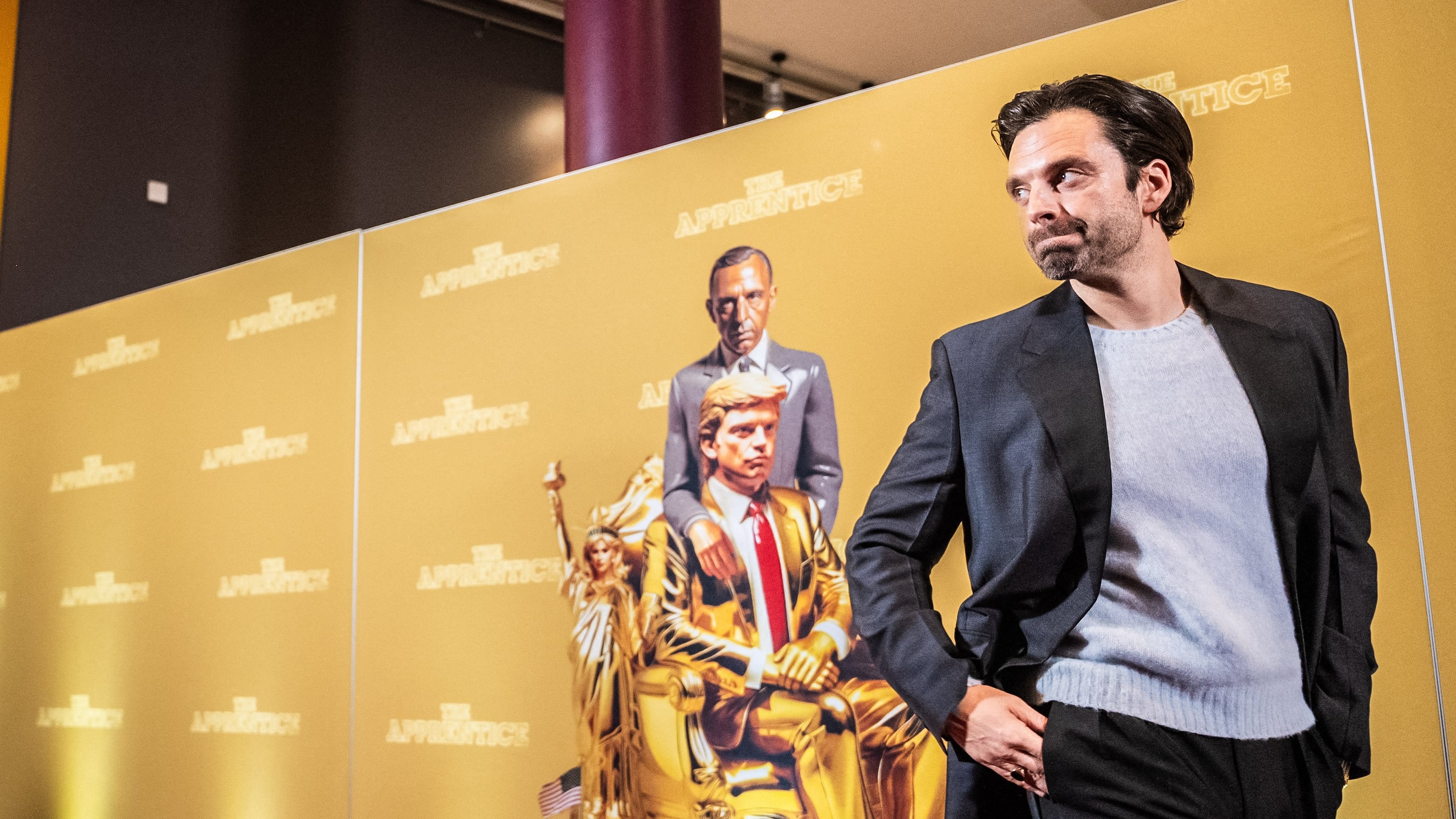 US-Romanian actor Sebastian Stan poses for a photo as he arrives for the gala premiere of the movie The Apprentice at the Imperial in Copenhagen, Denmark, on October 16, 2024. The explosive Donald Trump biopic "The Apprentice" premiered in Denmark after it hit US theaters, with filmmakers gambling that it will draw audiences in a fiercely polarized nation just weeks before its subject's election showdown with rival Kamala Harris. The hot-topic film about the Republican candidate's younger years has drawn legal threats from Trump's attorneys, not least for deeply unflattering scenes including a depiction of the former president raping his wife. (Photo by Emil Nicolai Helms / Ritzau Scanpix / AFP) / Denmark OUT