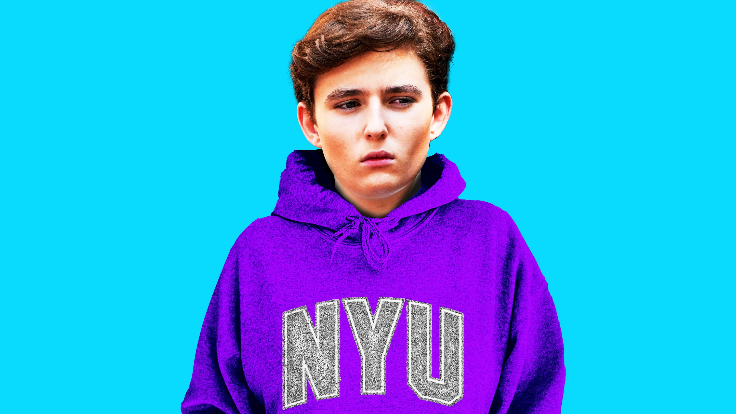 Barron Trump in a NYU sweatshirt