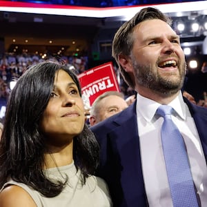 U.S. Sen. J.D. Vance (R-OH) and  his wife Usha Chilukuri Vance look on as he is nominated for the office of Vice President on the first day of the Republican National Convention at the Fiserv Forum on July 15, 2024 in Milwaukee, Wisconsin. 