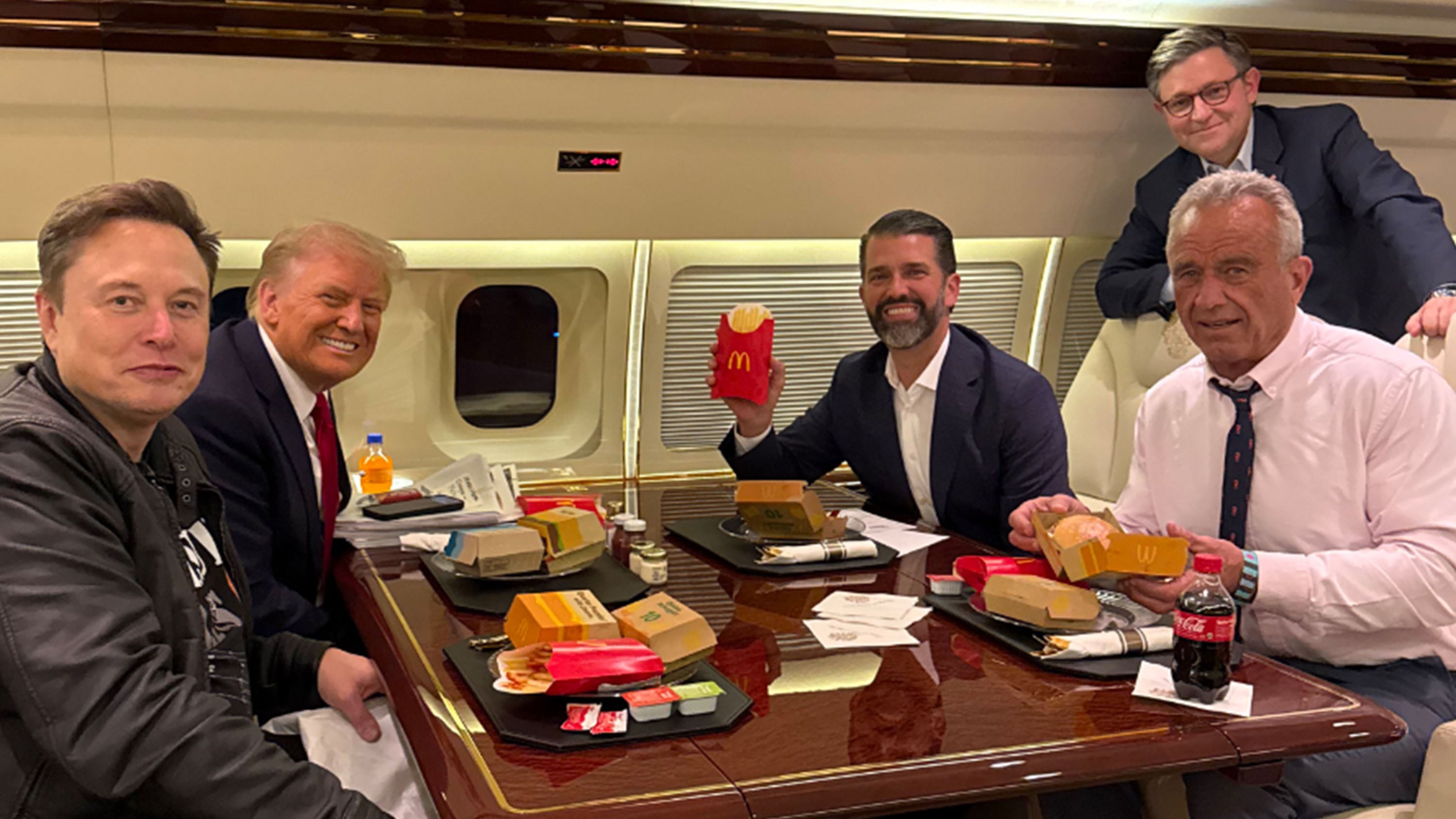 trump, musk, rfk jr, donald trump jr eating mcdonalds